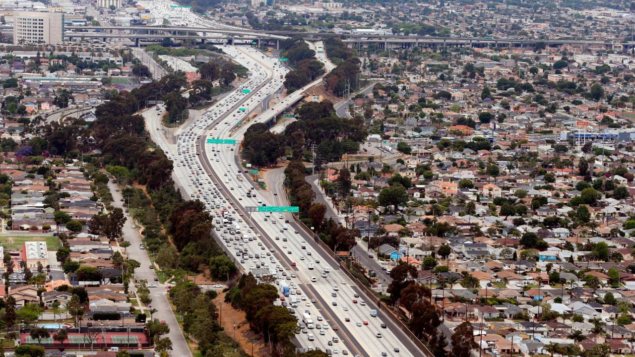 In this May 25, 2017, file photo, Interstate 405, the San Diego Freeway, is seen next to Los Angeles International Airport. (AP Photo/Reed Saxon)