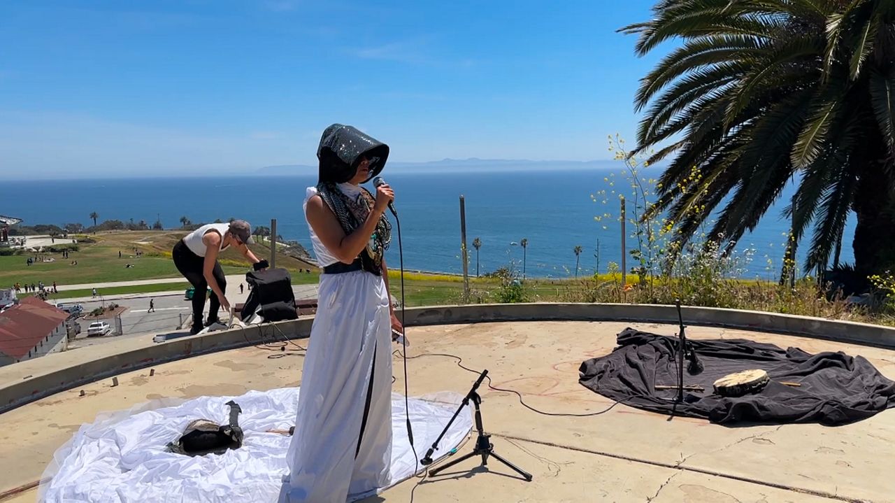 Yozmit the DogStar performs in San Pedro.