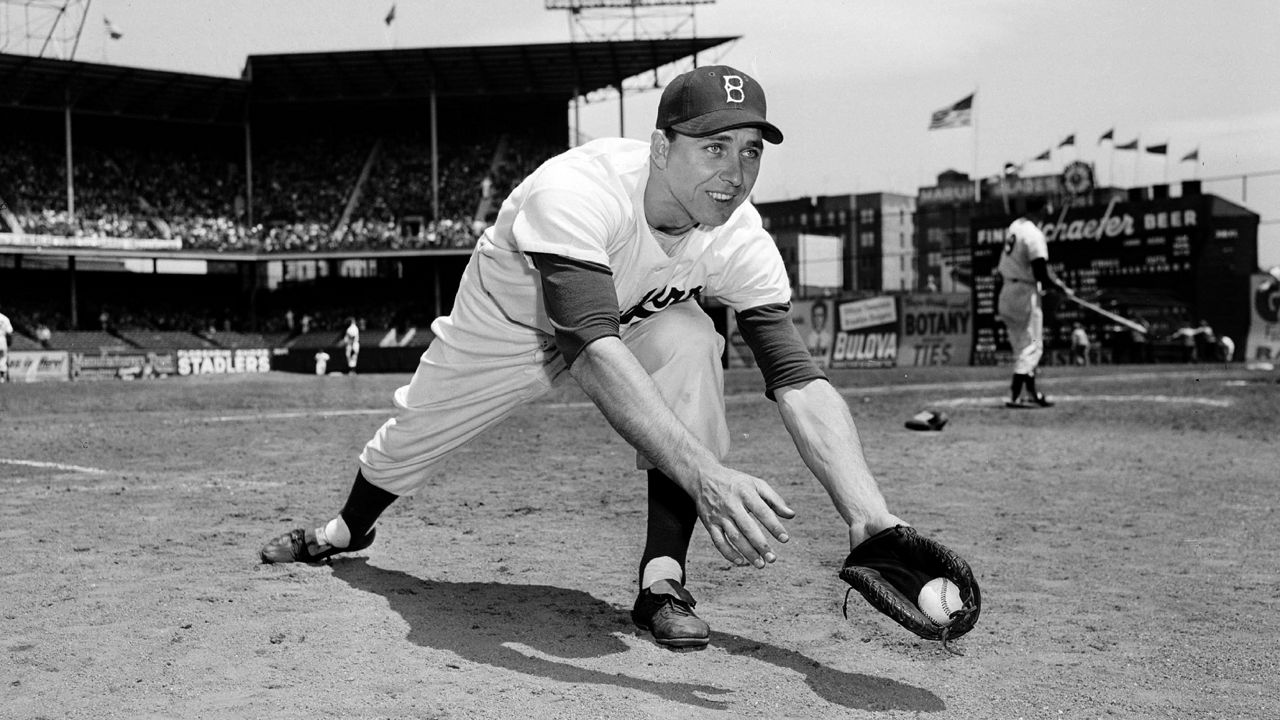 First baseman Gil Hodges of the Brooklyn Dodgers is shown in posed action in New York, May 17, 1952. (AP Photo/Harry Harris)