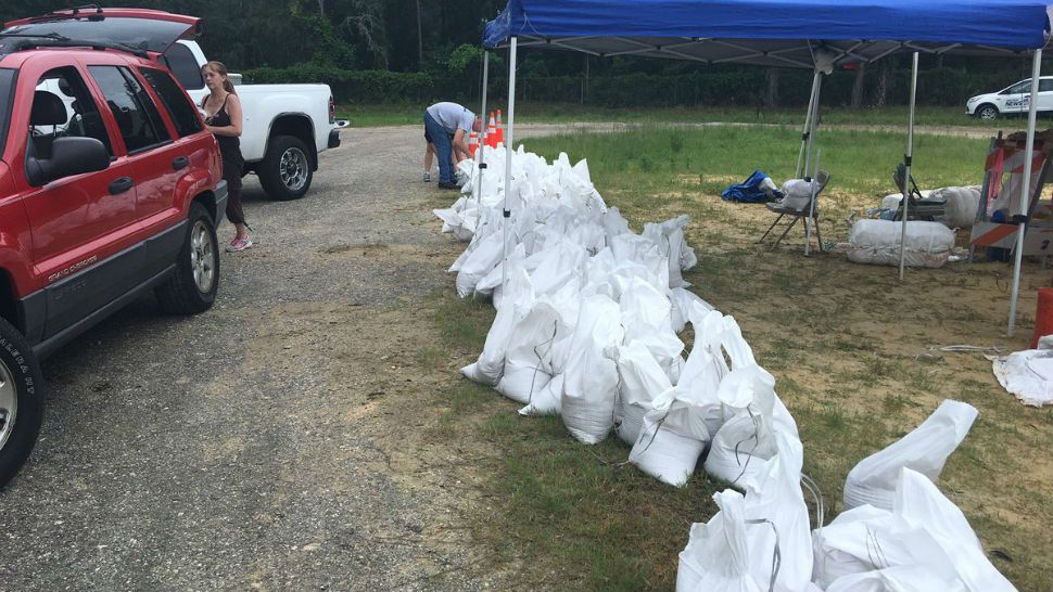 Sandbags lined up at a pickup location in Crystal River as residents prepare for potential flooding from Alberto. (Kim Leoffler, staff)