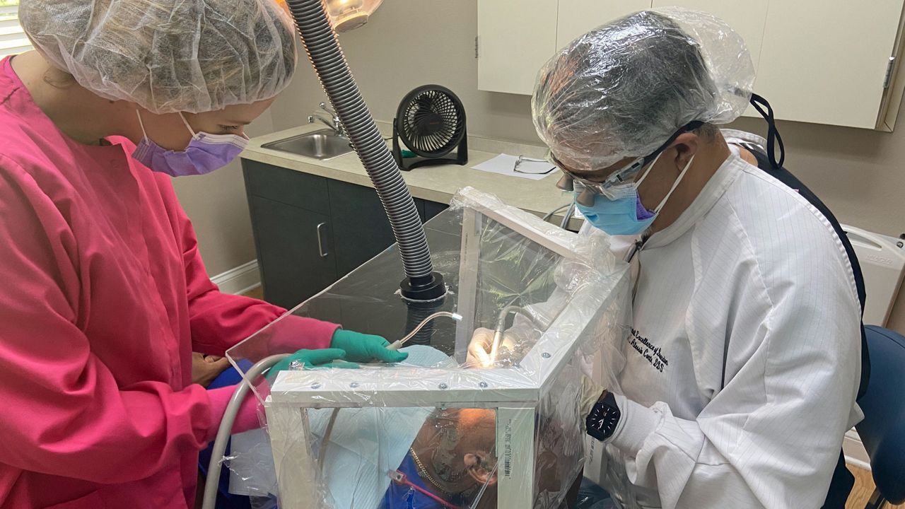 Brandon Dentist Creates Plastic Barriers for Patients, Staff