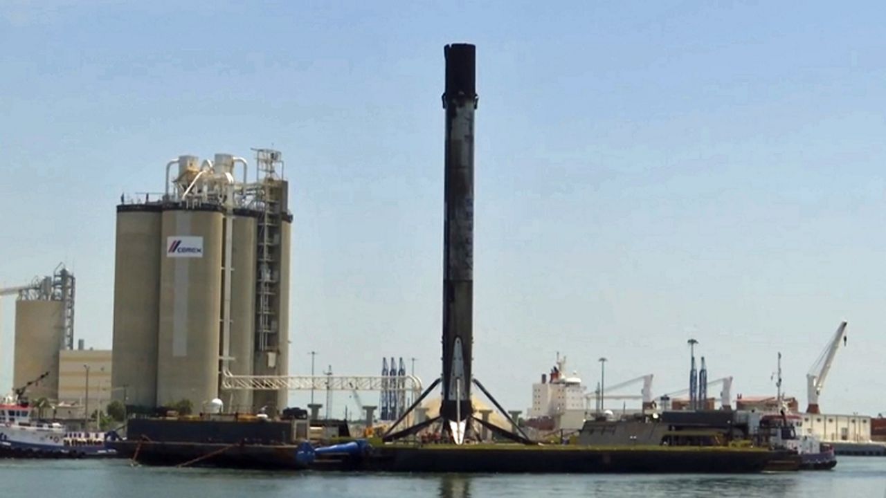 The Falcon 9 first stage booster returned on the SpaceX drone ship just before noon Tuesday.