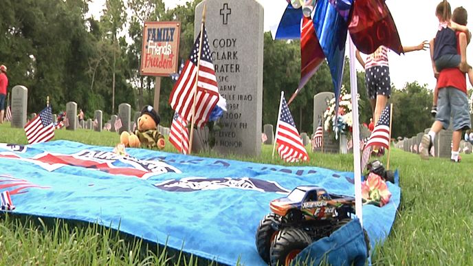 It's become a tradition for Rachel Tomon to bring her family to Florida National Cemetery each Memorial Day to remember her good friend Cody Grater. (Kim Leoffler, staff)