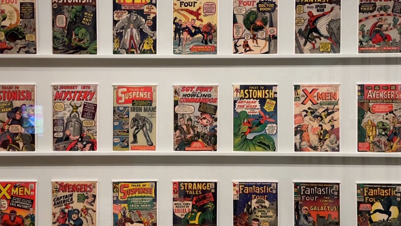 A wall displaying a series of comic books at the Skirball Cultural Center. (Spectrum News/Kristopher Gee)