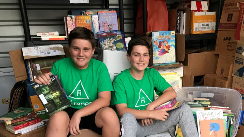 Vance Tomasi and Chase Hartman, both 13-years-old, started the Read Repeat program in 2016 to share their love of books and to save the planet. (Courtesy of Read Repeat website)