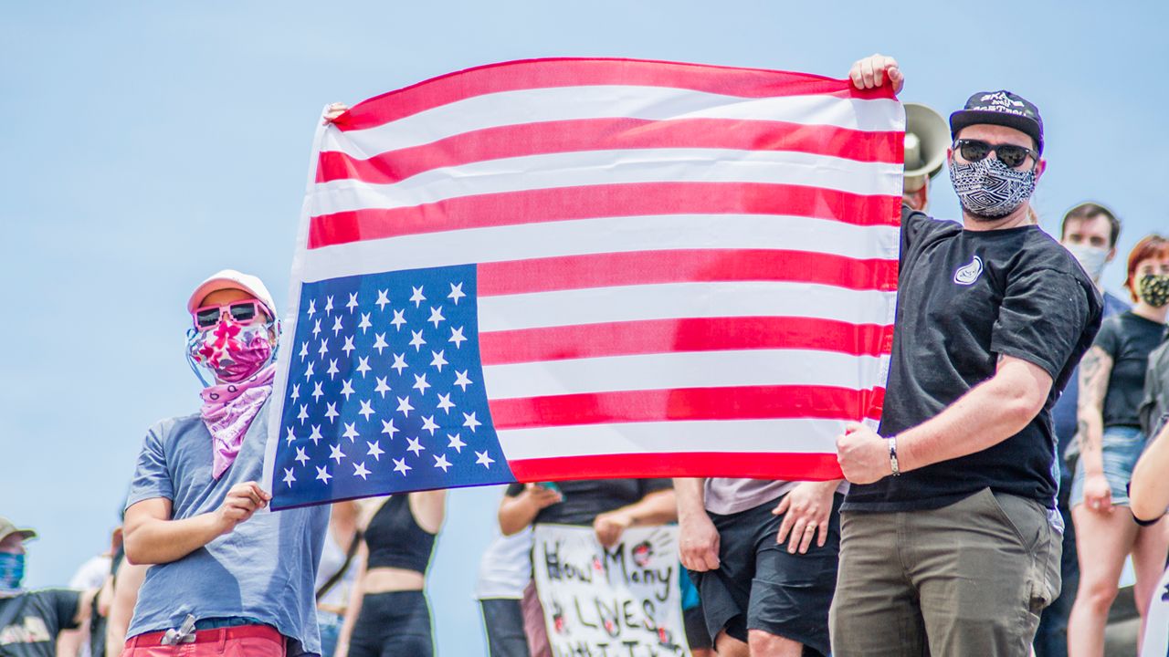 People protest in Austin over police killings.