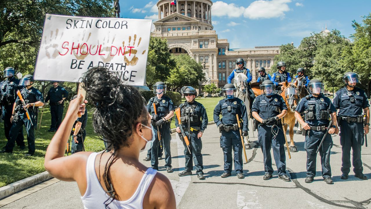 People protest in Austin over police killings.