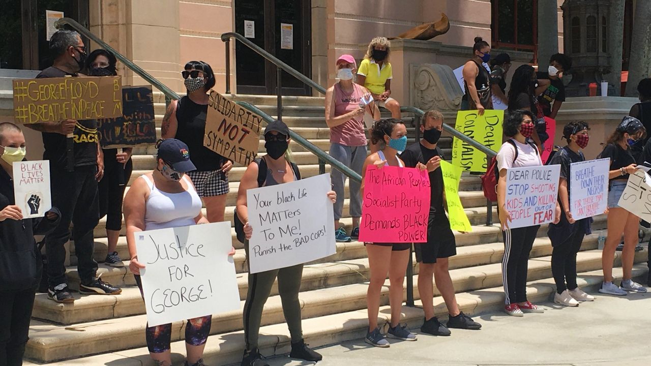 Protesters gathered in St. Petersburg on Saturday to speak out against the death of George Floyd. (Dave Jordan/Spectrum Bay News 9)