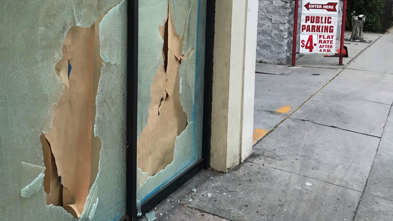 Police worked to disperse crowds in downtown Los Angeles as multiple businesses were looted following demonstrations against police brutality after the death of George Floyd in Minneapolis. (Spectrum News/Alex Baker)