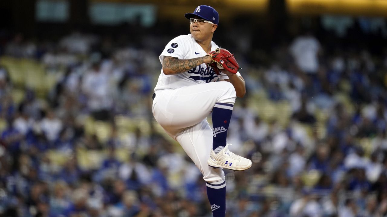 Los Angeles Dodgers starting pitcher Julio Urias throws during the first inning of a baseball game against the Atlanta Braves, Monday, Aug. 30, 2021, in Los Angeles. (AP Photo/Marcio Jose Sanchez)
