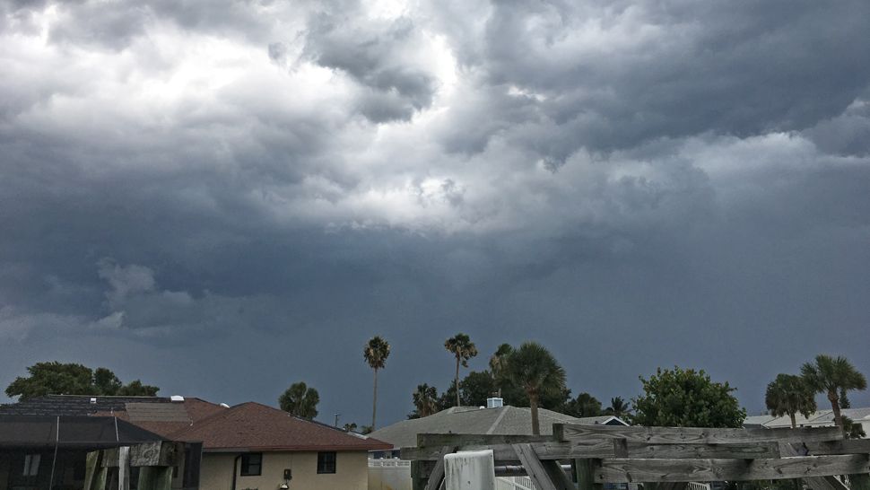 Sent via Spectrum News 13 app: Dark storm clouds were seen over Satellite Beach on Monday, June 4, 2018. (Robin Braswell, Viewer)