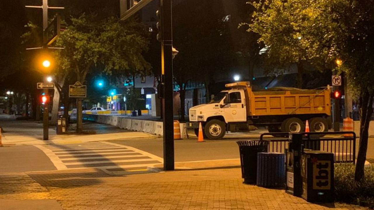 The use of dump trucks is an added security detail as the city moves in to the second weekend of protests, some of them violent, over the killing of George Floyd in Minneapolis almost two weeks ago. (Jason Lanning/Spectrum Bay News 9)