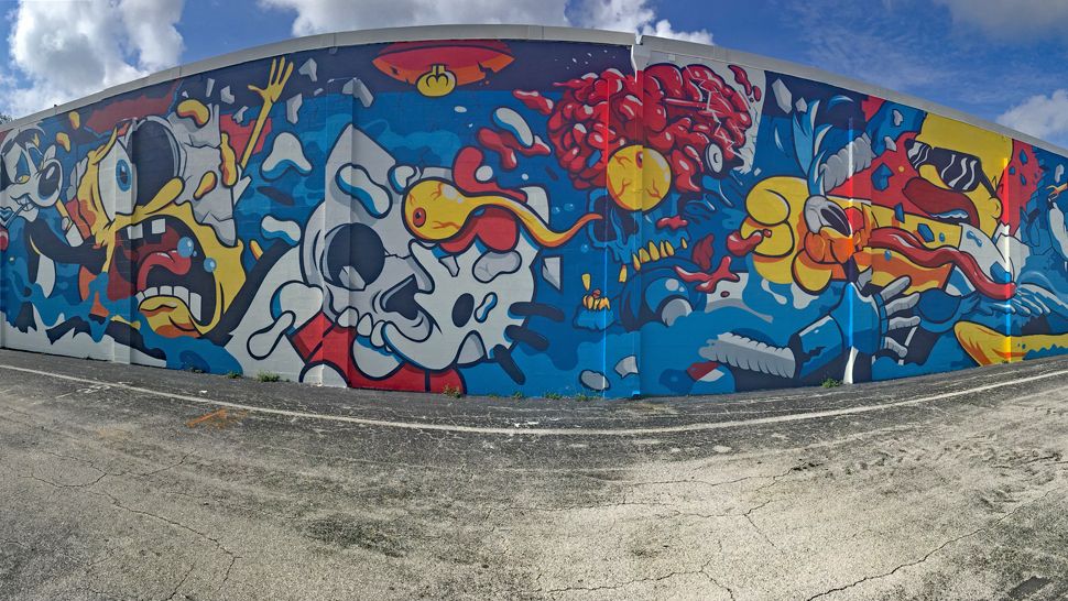 The mural depicts mutilated cartoon characters, including SpongeBob SquarePants, Wile E. Coyote and Homer Simpson. (File photo)