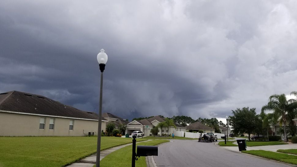 Submitted via the Spectrum News 13 app: Rain clouds were seen over Wyndham Lakes in Orlando on Monday, June 17, 2019. (Photo courtesy of Eddie Deese, viewer)