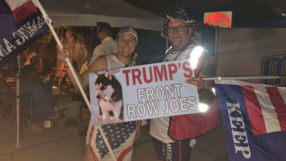 These supporters from Wisconsin and Minnesota try to get front row seats at all of President Donald Trump's rallies. They got to Orlando around 5 a.m. Monday, to be the first at the Orlando re-election kickoff rally at Tuesday, June 18, 2019. (Jerry Hume/Spectrum News) 