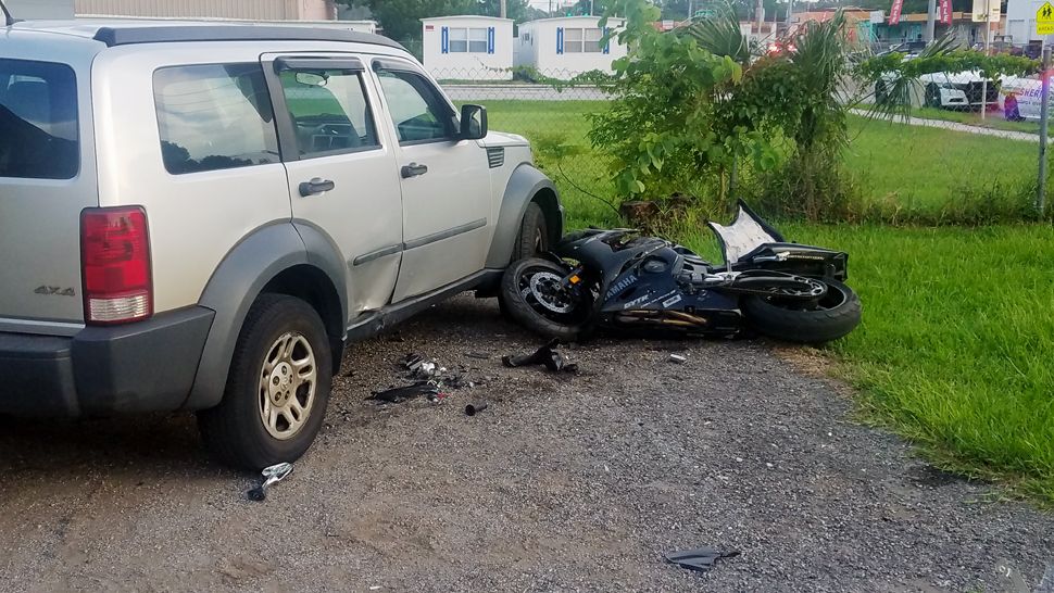 Travis Lester, of Lakeland, was driving his motorcycle going east on Jungle Street "at a high-rate of speed" when he hit his brakes and caused an estimated 300-foot skid mark before striking this SUV on Combee Road. (Polk County Sheriff's Office)