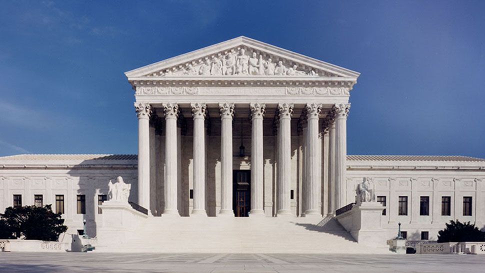 The high court on Tuesday reversed lower-court orders preventing the Pentagon from implementing its plans. (File photo of the U.S. Supreme Court)