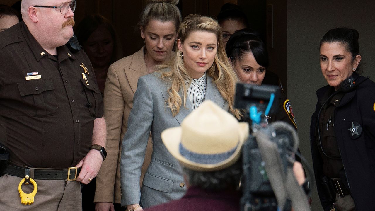 Actress Amber Heard departs the Fairfax County Courthouse Friday in Fairfax, Virginia. (AP Photo/Craig Hudson)