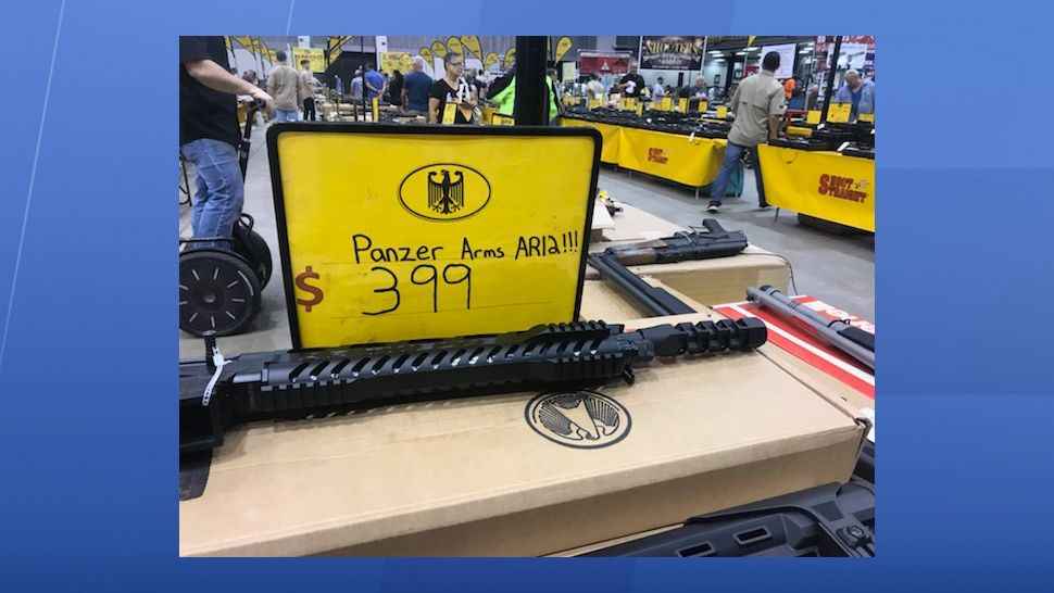 It's a big day for business for Mike Wilcox and his team with Shoot Straight. Their booth is one of the largest at the Florida Gun Show, which is spending the weekend at the Florida State Fairgrounds. (Angie Angers, staff)