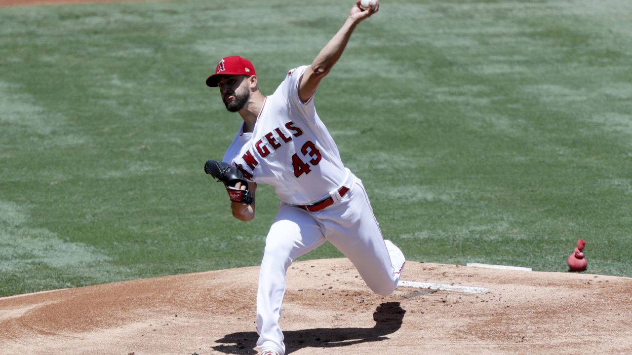 Los Angeles Angels starting pitcher Patrick Sandoval throws to a Seattle Mariners batter during the first inning of a baseball game in Anaheim, Calif., Sunday, June 6, 2021. (AP Photo/Alex Gallardo)