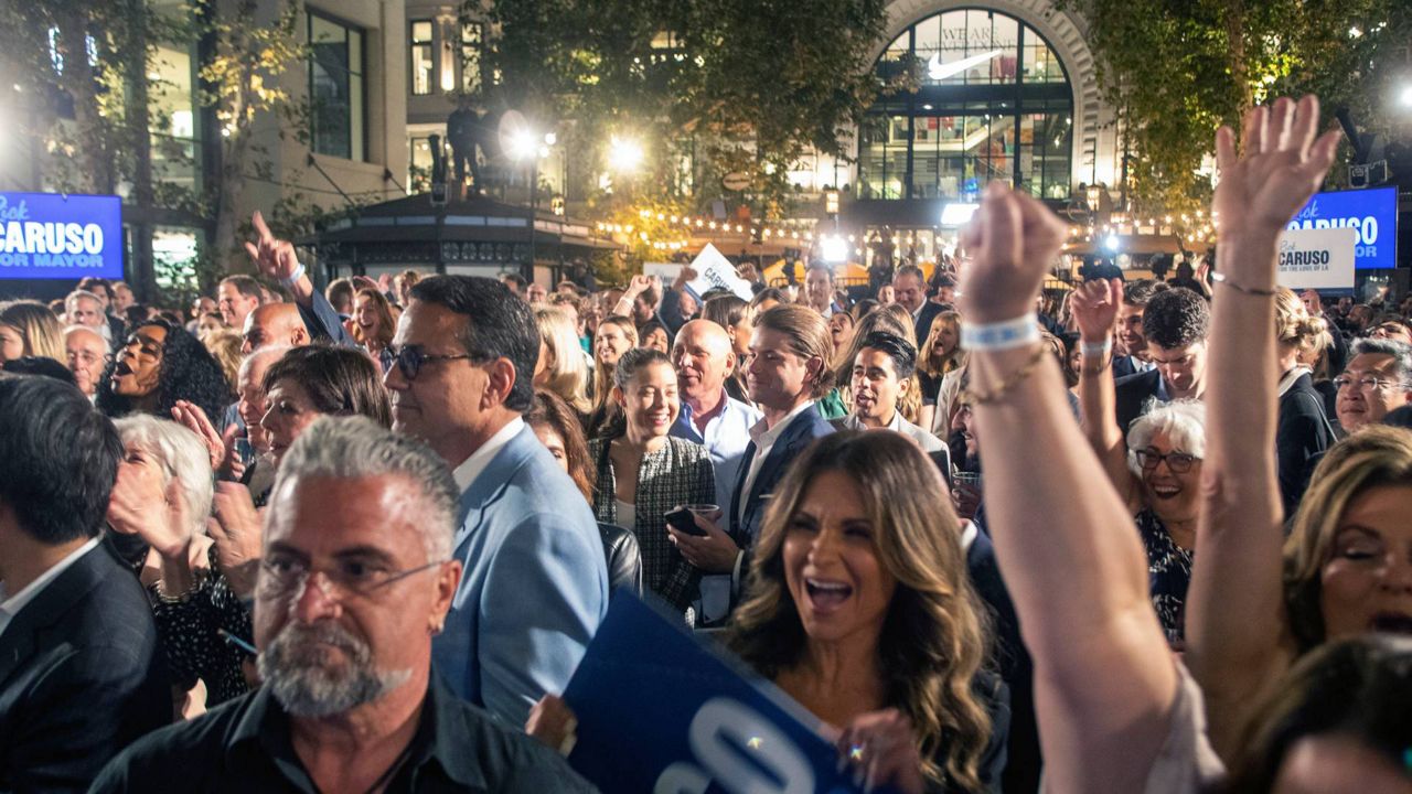 Supporters cheer during a primary-night event for Rick Caruso, a Democratic candidate for Los Angeles mayor, on Tuesday. (AP Photo/Alex Gallardo)
