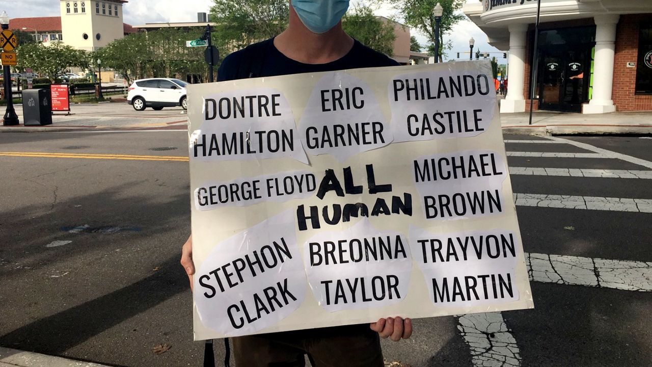 Hundreds of people gathered at Munn Park in Lakeland for another Black Lives Matter protest in memory of George Floyd. (Dave Jordan/Spectrum News)