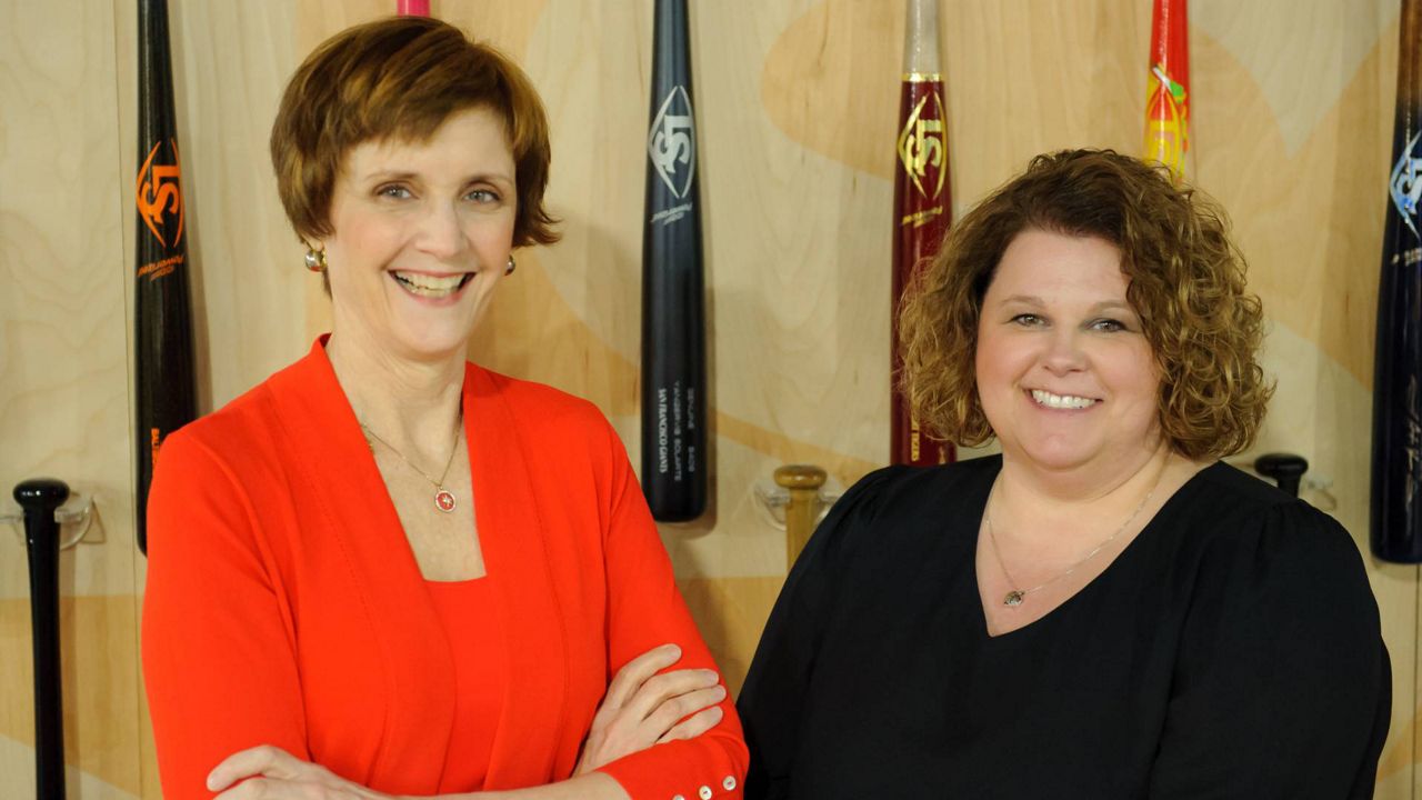 Outgoing Louisville Slugger Museum & Factory leader Anne Jewell (left) alongside incoming leader Deana Lockman (right). (Hillerich & Bradsby Co.)