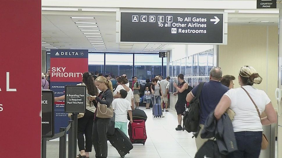 A crowd of people inside of an airport. (Spectrum News file image)