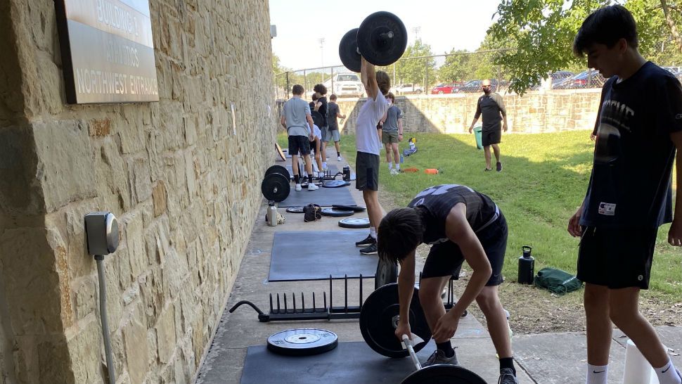 Vandegrift High School athletes life weights. (Travis Recek/Spectrum News)