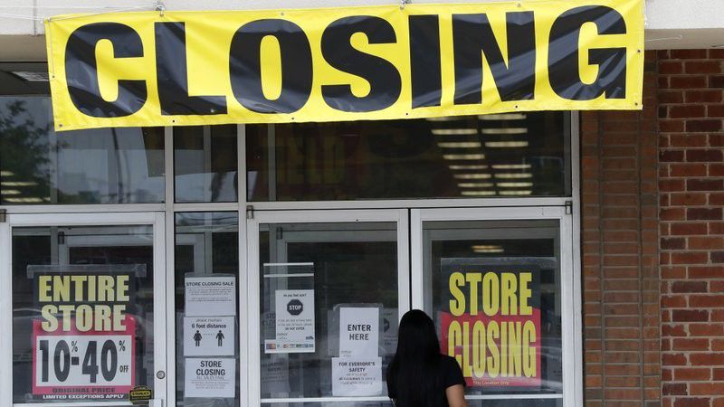 A woman walks into a closing Gordmans store, Thursday, May 28, 2020, in St. Charles, Mo. Stage Stores, which owns Gordmans, is closing all its stores and has filed for Chapter 11 bankruptcy. (AP Photo/Jeff Roberson)