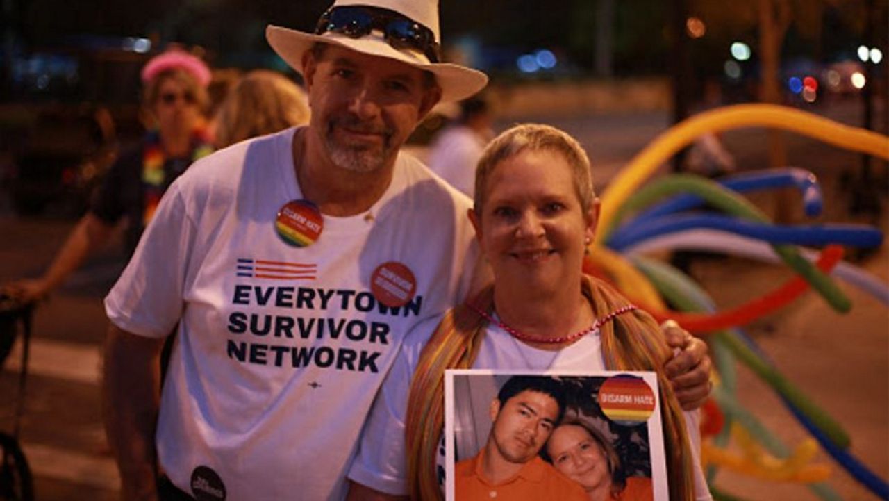 Fred and Maria Wright march for gun reform in honor of their son Jerry who was killed June 12, 2016 at Pulse nightclub. (Courtesy: Fred and Maria Wright)