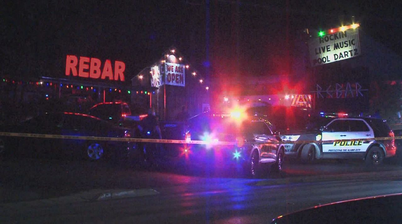 An image of San Antonio police at Rebar after a man opened fire on a crowd of people and wounded eight June 12, 2020 (Stringer/J.J. Trevino)