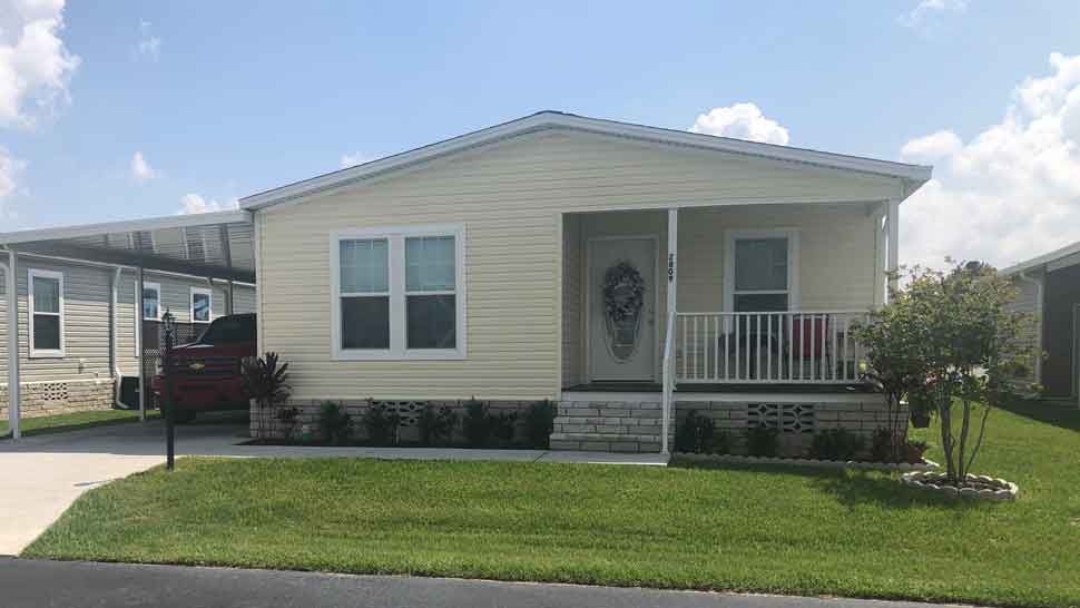 Ronald Strouse, 73, is accused of strangling his wife in the living room of their Lake Wales home (pictured). Deputies arrested Strouse Wednesday and charged him with first-degree murder. (Stephanie Claytor/Spectrum Bay News 9)