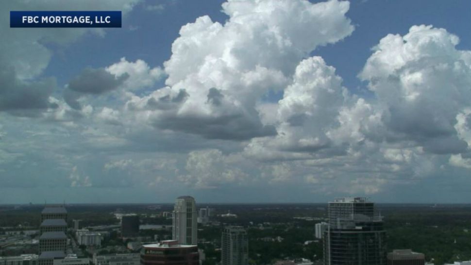 Clouds blanket the sky over downtown Orlando on Tuesday afternoon. (Sky 13 camera)