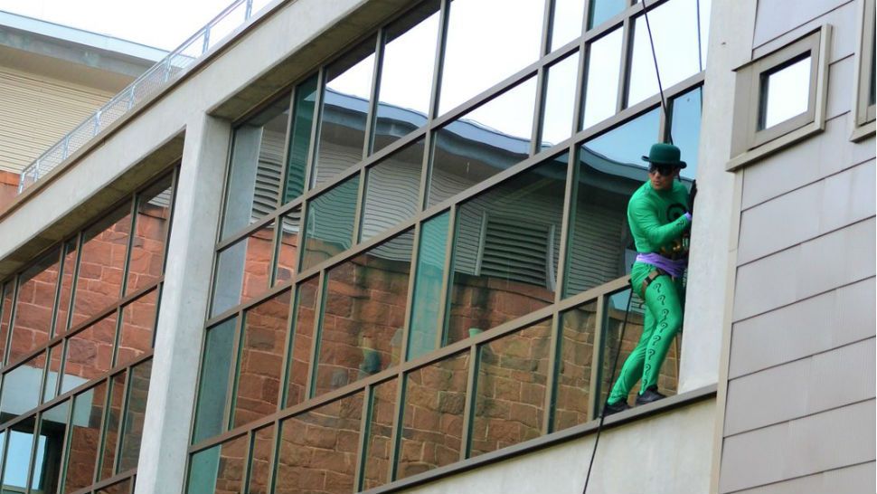 The Riddler scaled the side of Dell Children's Hospital for Super Heroes Day. (Courtesy: @Austin_Police)