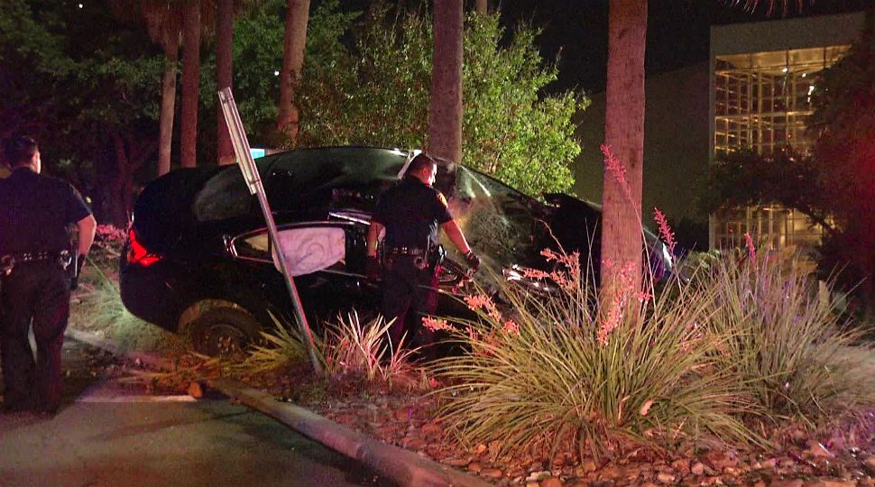 Vehicle flipped into trees of North Star Mall parking lot June 12, 2019 (Ken Branca)