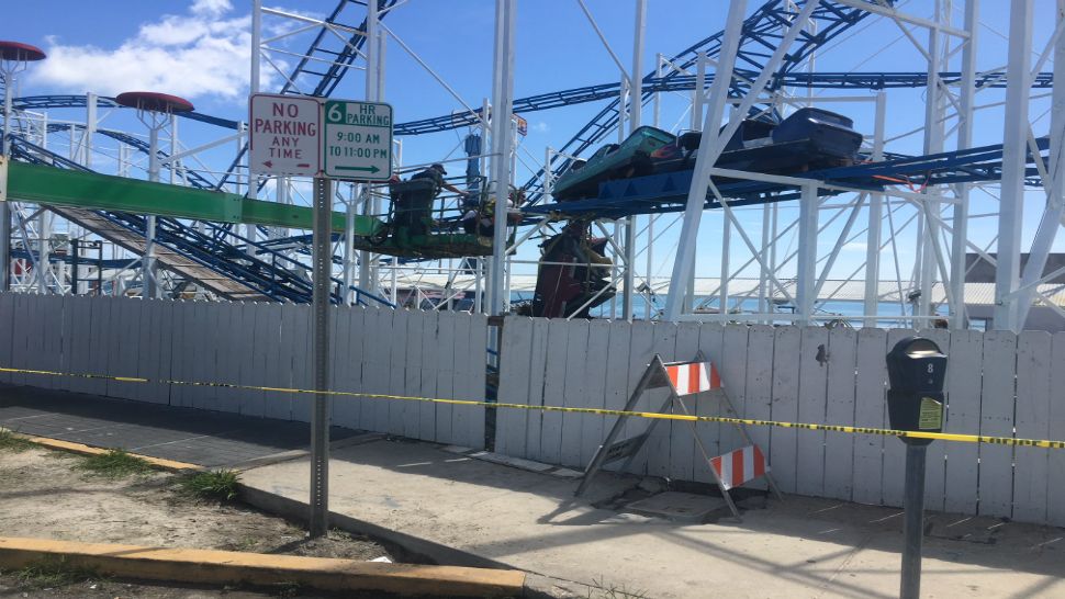 Two people in the front car fell 34 feet to the ground and were rushed to the hospital as trauma alerts with four others being hospitalized as well (Brittany Jones, Staff).
