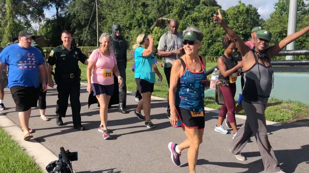Orange County Sheriff John Mina joined residents for the inaugural 5K on the Pine Hills Trail. (Jesse Canales, Spectrum News)
