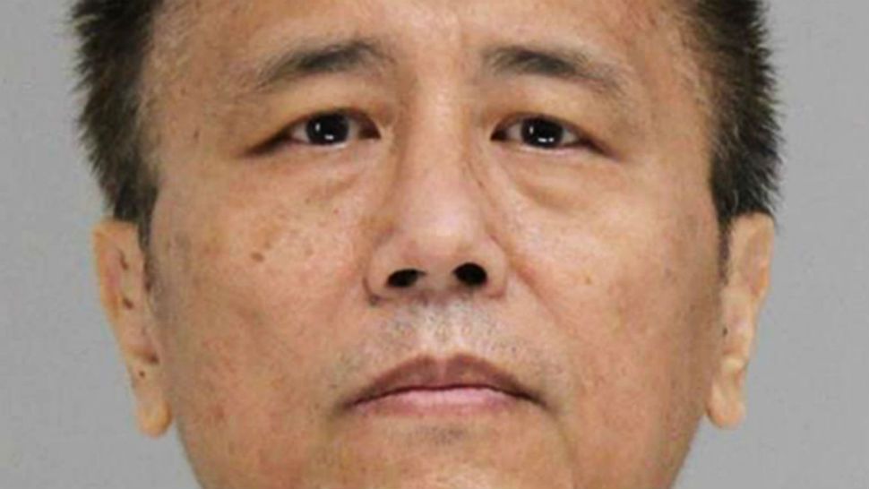 This photo provided by the Dallas County Jail shows George Guo, who is being held Thursday, June 14, 2018, on a capital murder charge. Prosecutors in Dallas say Guo, an ex-physician, has been charged in the death of a woman left incapacitated after being sexually assaulted and strangled in 1988. (Dallas County Jail via AP)