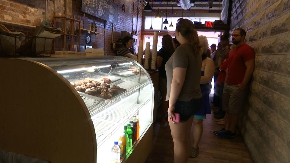 Cocoa locals show their support for a closing "Sugar Shack" doughnut shop. Shop to officially close on Father's Day. (Krystel Knowles, staff)