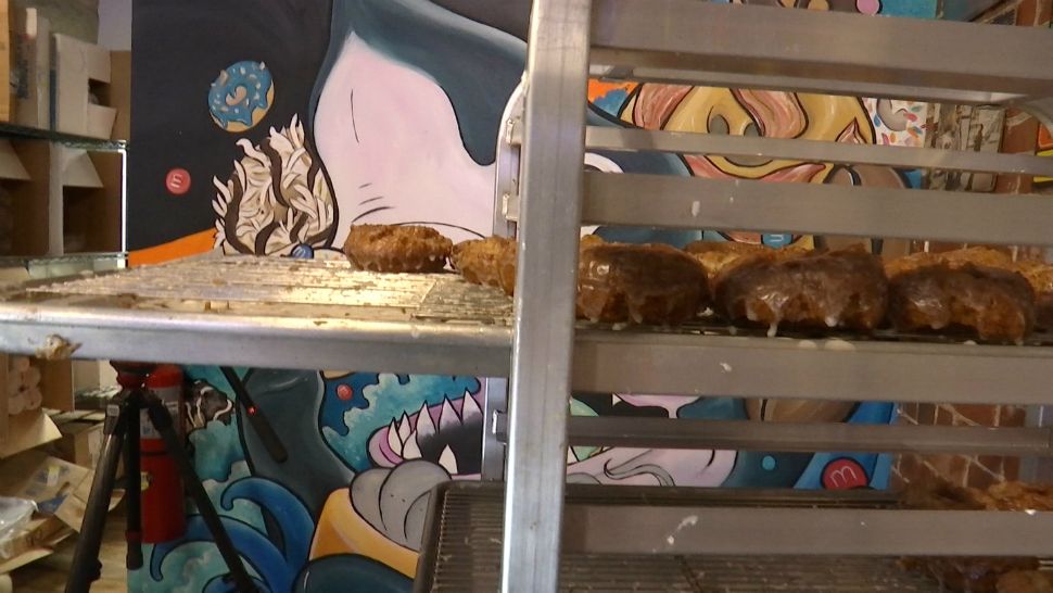 Cocoa locals show their support for a closing "Sugar Shack" doughnut shop. Shop to officially close on Father's Day. (Krystel Knowles, staff)