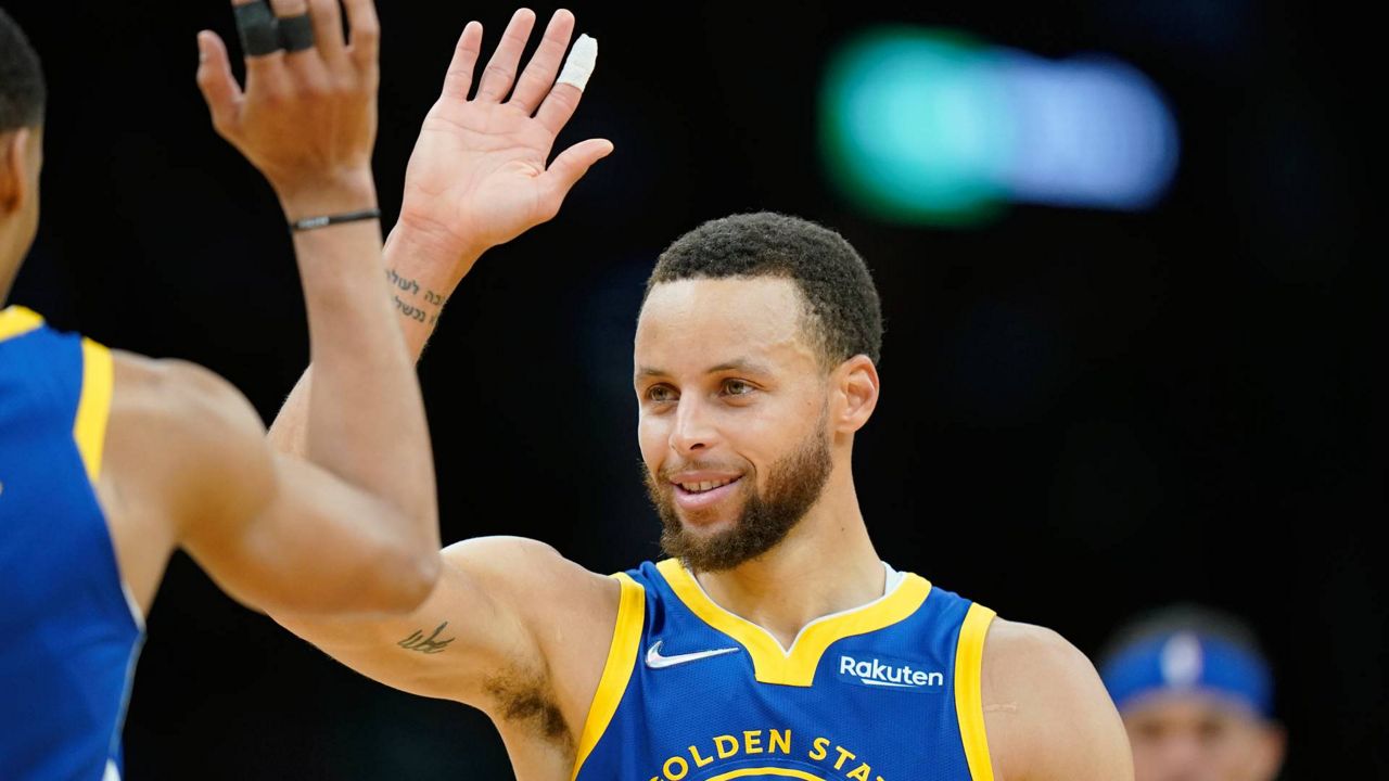 Golden State Warriors guard Stephen Curry (30) reacts during the second quarter of Game 6 of the NBA Finals against the Celtics Thursday in Boston. (AP Photo/Steven Senne)