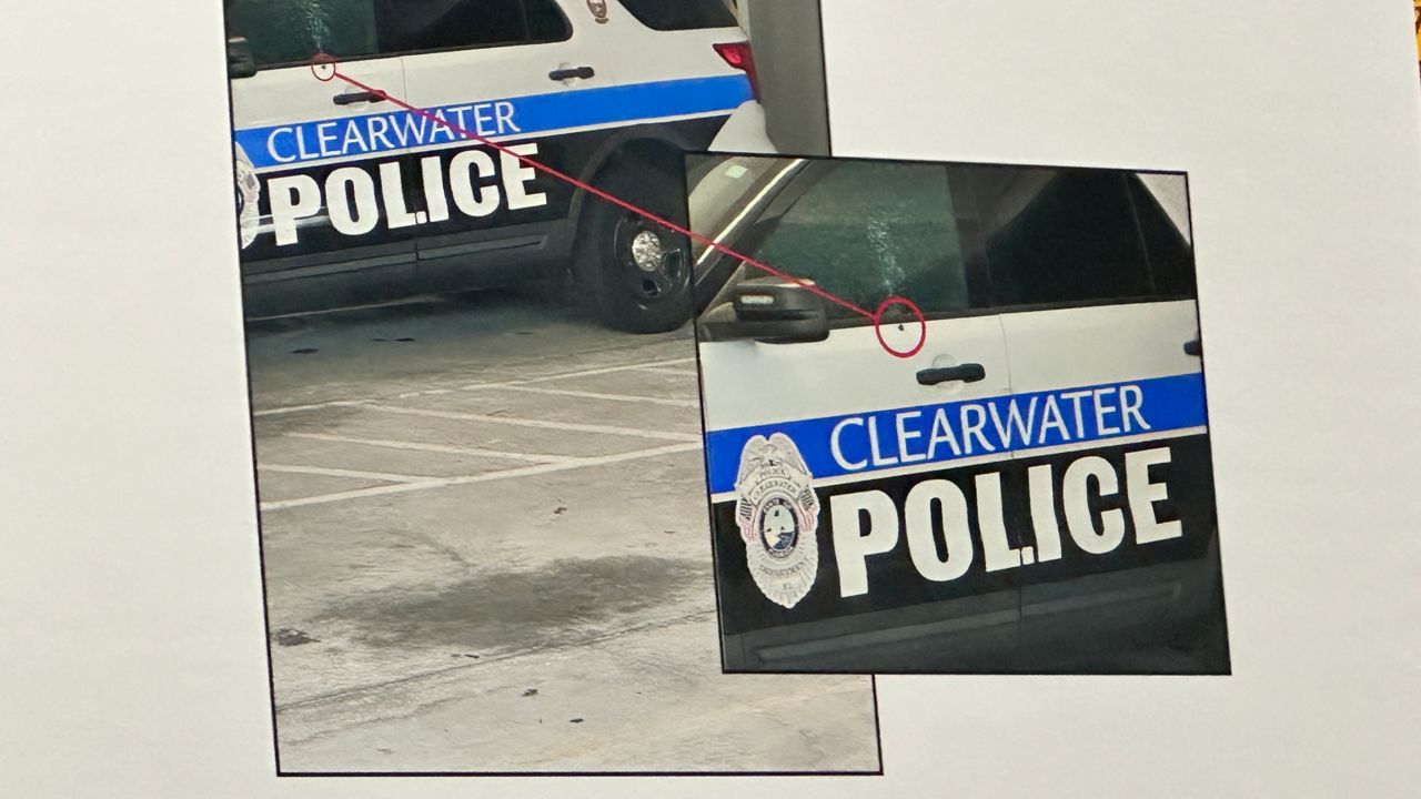 The Clearwater Police Department displayed this image Monday of one of its patrol cars hit by a bullet. (Spectrum Bay News 9)