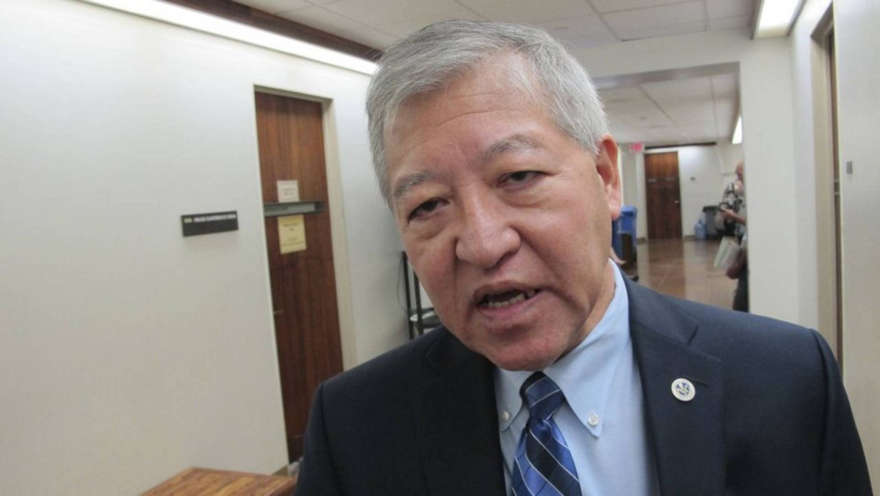 FBI agents arrested former Honolulu prosecutor Keith Kaneshiro on Friday morning. (Associated Press/Cathy Bussewitz)