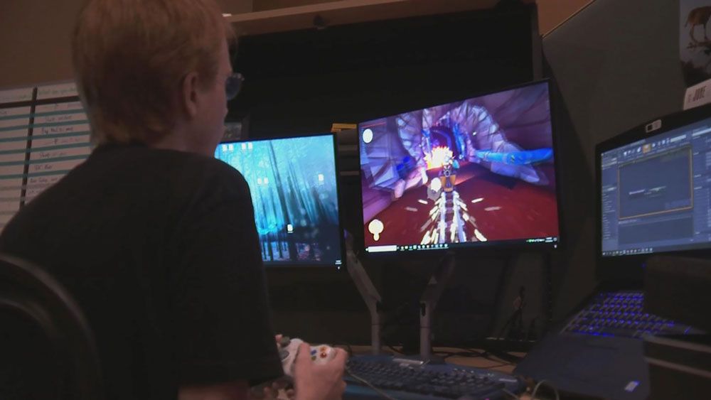 A young man plays a video game. (File)