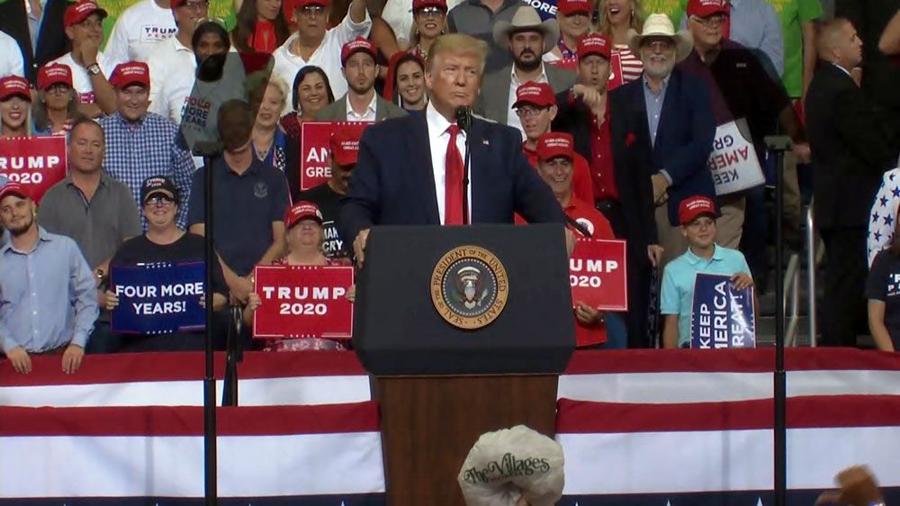 President Donald Trump tells a mostly-full Amway Center crowd Tuesday night that he's been tough on Russia and that the left wants to "radicalize our judiciary." (Spectrum News)