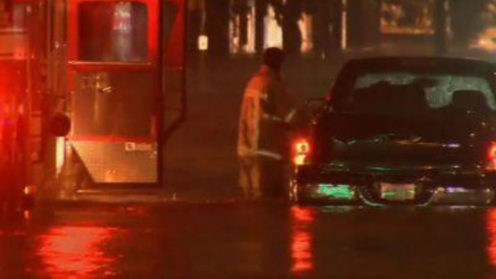 The National Weather Service forecasts that a slow moving storm will drop heavy rain and possibly cause flash floods along the Texas coastline. Some cars were stuck on flooded roads in Corpus Christi on Tuesday night. (June 20)