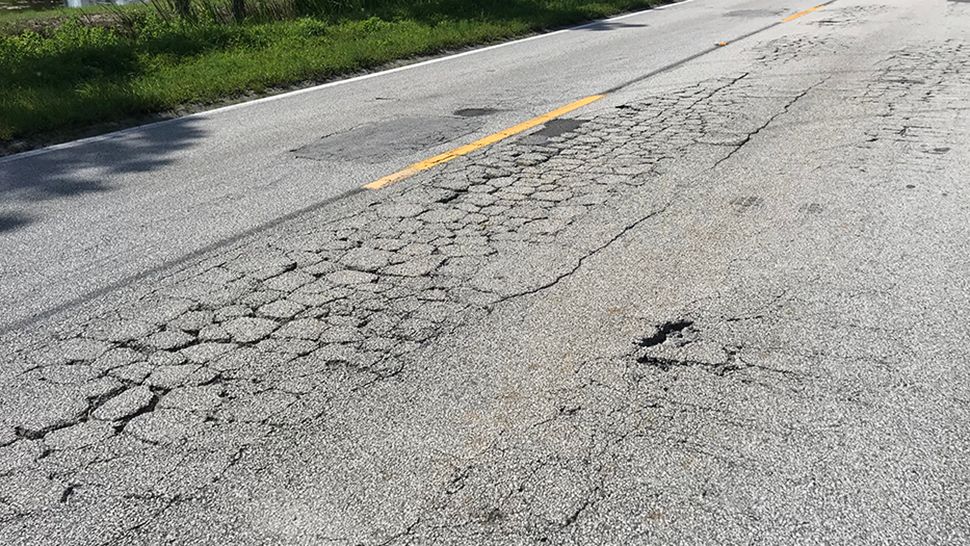 People in Palm Bay are concerned about the condition of Babcock Street, which is plagued with potholes and patchwork. (Greg Pallone/Spectrum News 13)