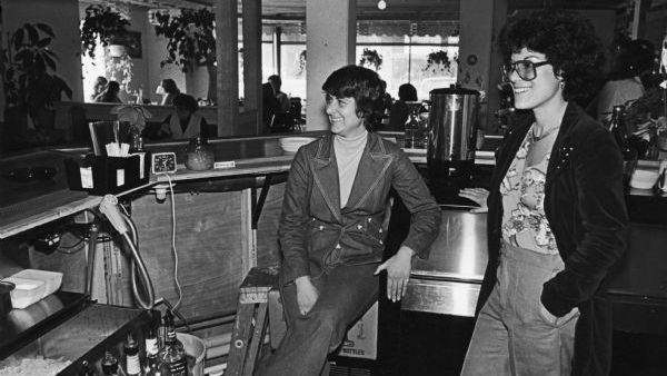 Employees wait behind the bar at Lysistrata, a feminist bar in Madison, in 1978