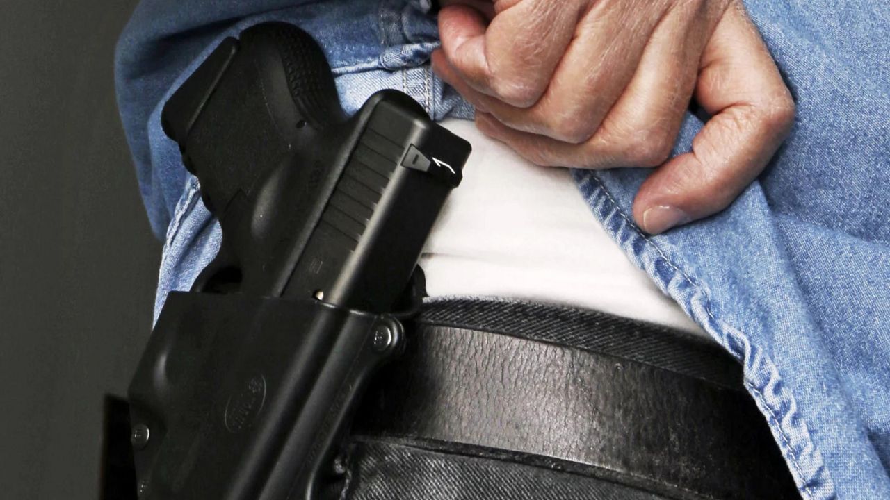 Hawaii's strict gun laws currently require people to provide a compelling reason why they need to carry a firearm to obtain a permit. (Associated Press)